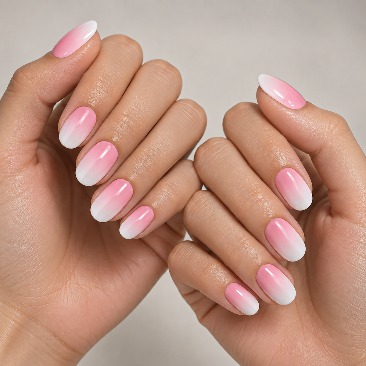 Flushing Pink Ombre by Make Them Gelly, worn on a hand