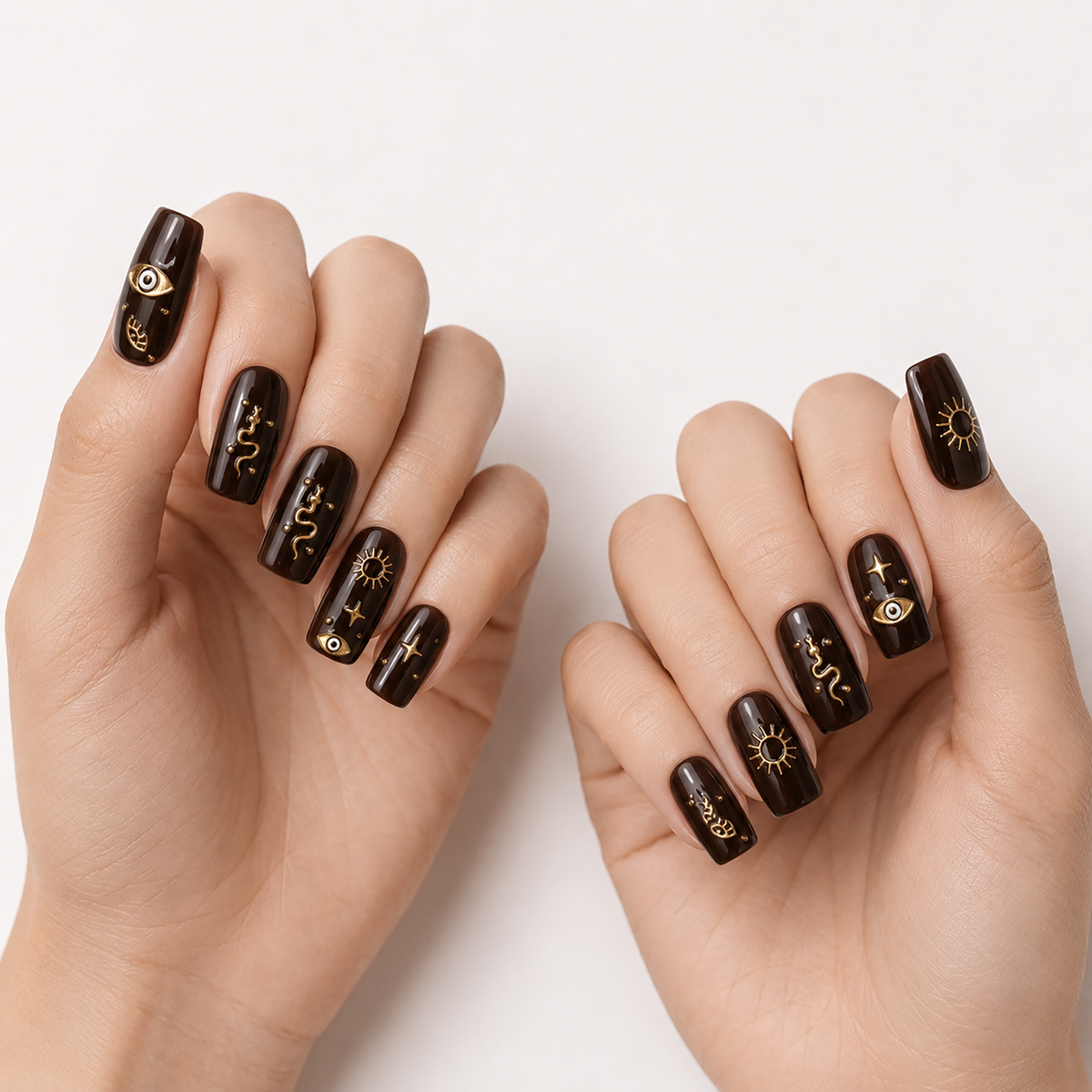 Gold Protective Evil Eyes by Make Them Gelly, worn on a hand
