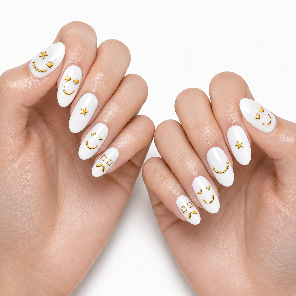 Gold Faces by Make Them Gelly, worn on a hand