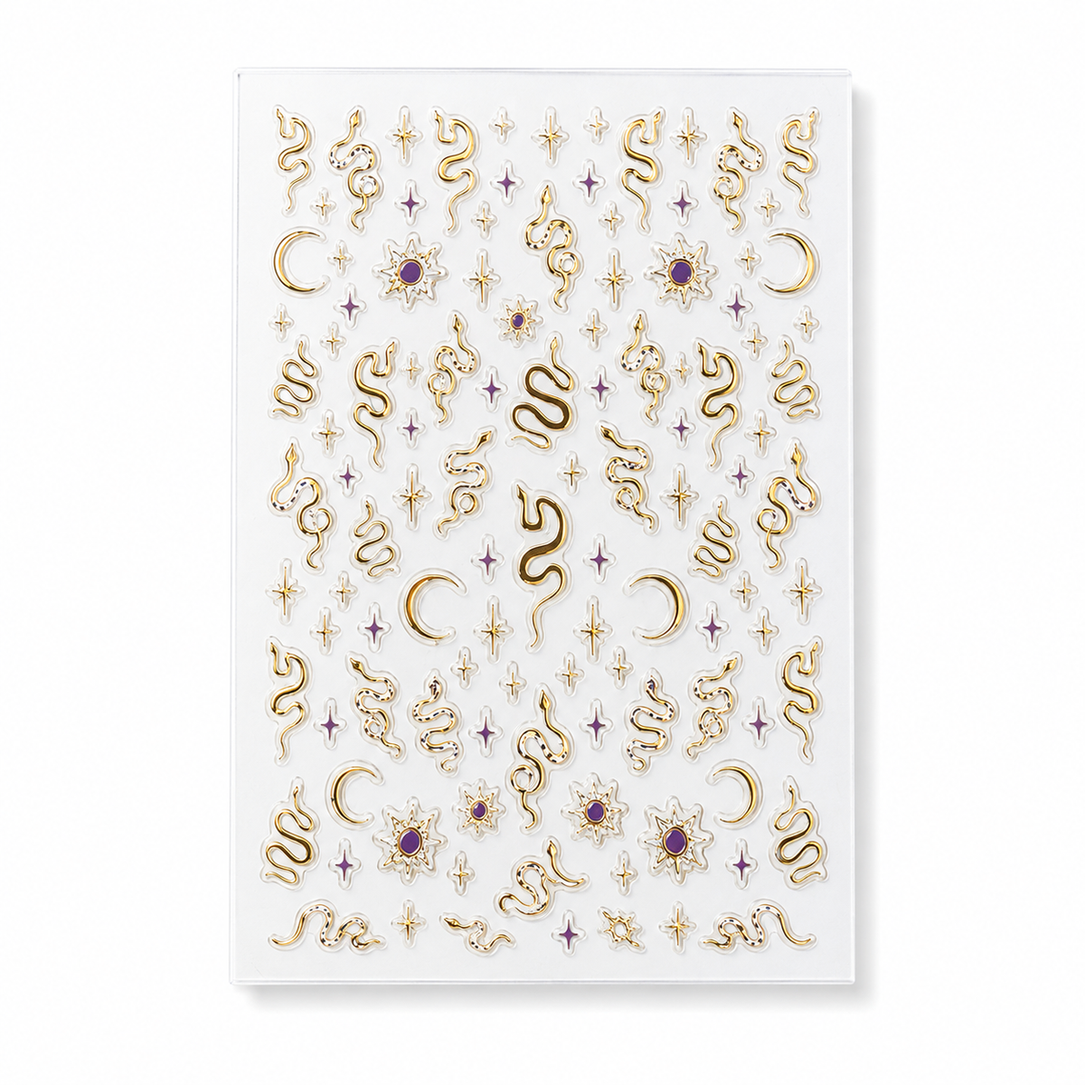 Gold snakes, Stars and Moons by Make Them Gelly, product shot on a plain background