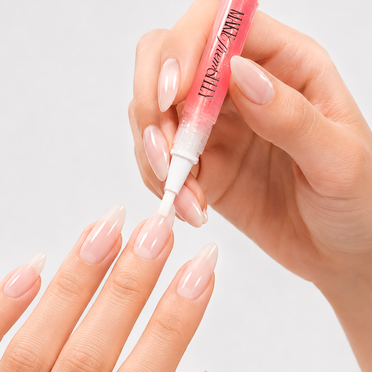 Musk Stick Glow-Up Nail Elixir by Make Them Gelly, worn on a hand