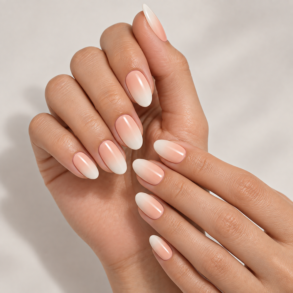 Pearl Blush Ombre by Make Them Gelly, worn on a hand