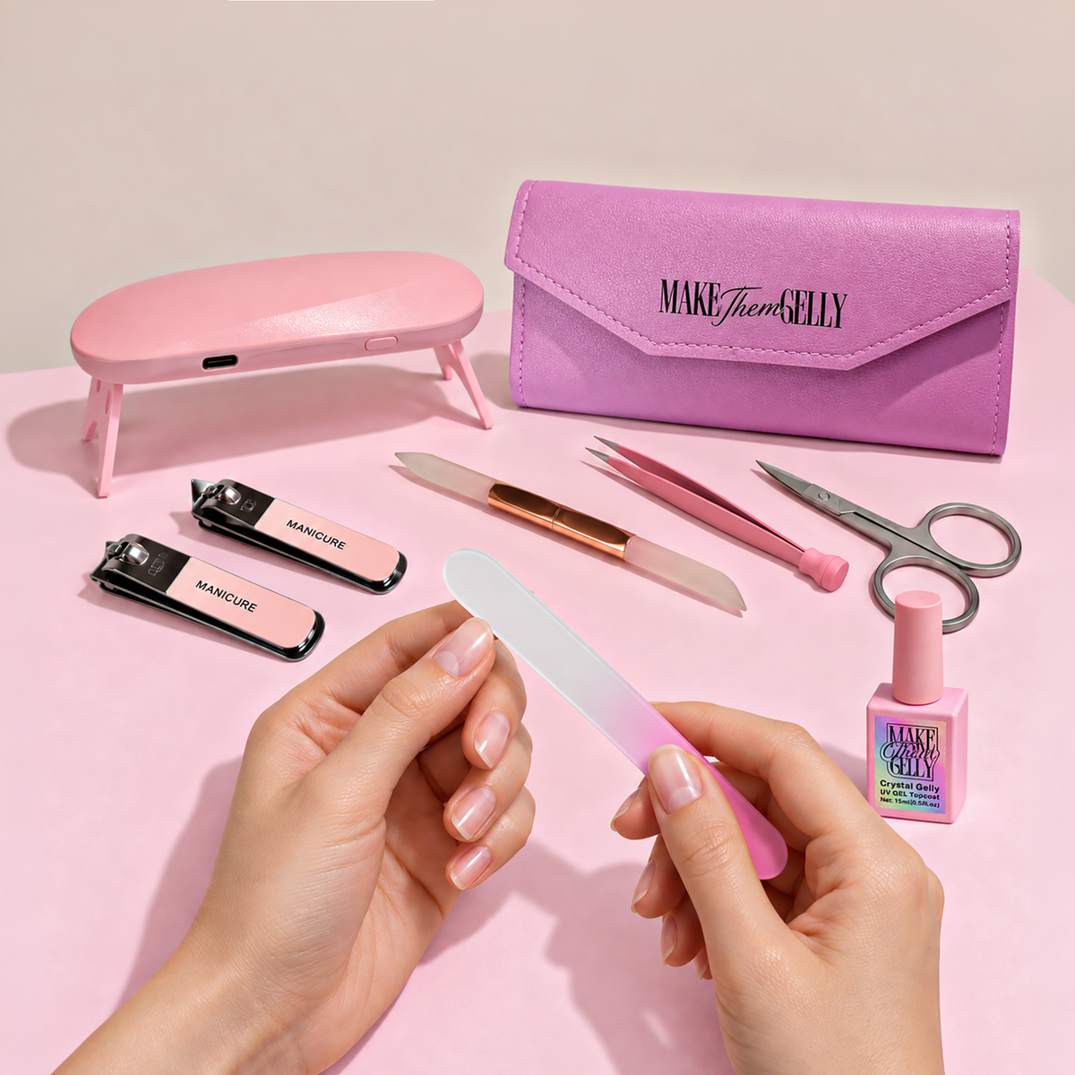 Signature Deluxe Manicure Kit by Make Them Gelly, worn on a hand