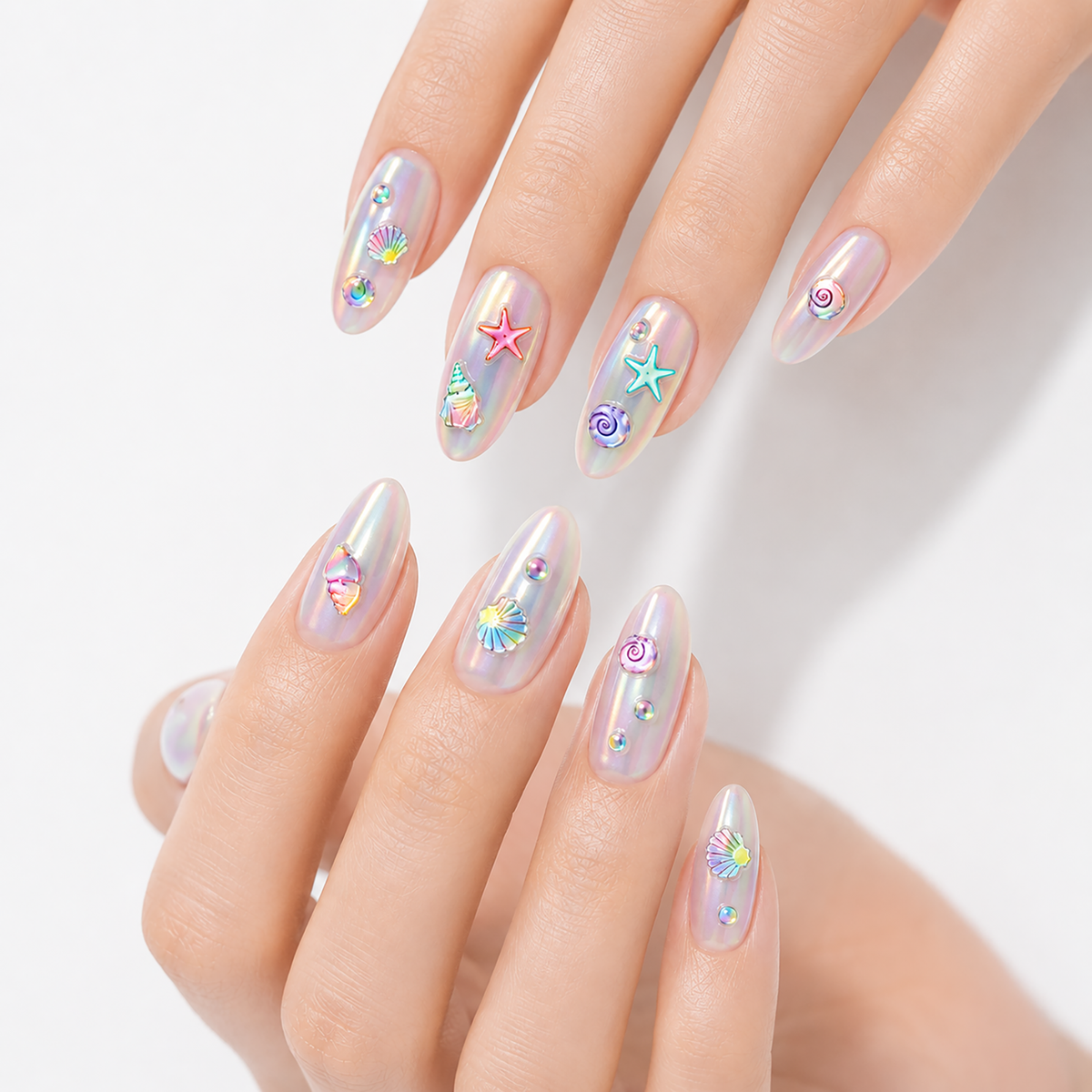 Water Colour Seashells by Make Them Gelly, worn on a hand